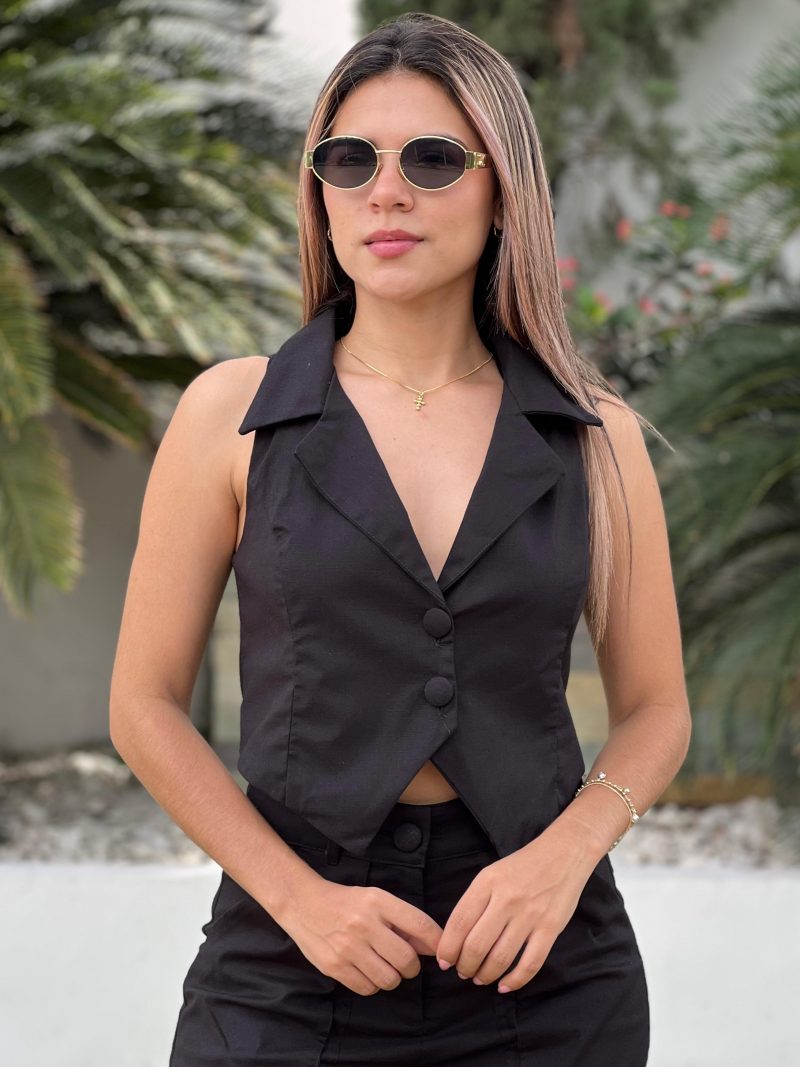 Chaleco holgada con solapa y cuello sport con puntas delanteras
