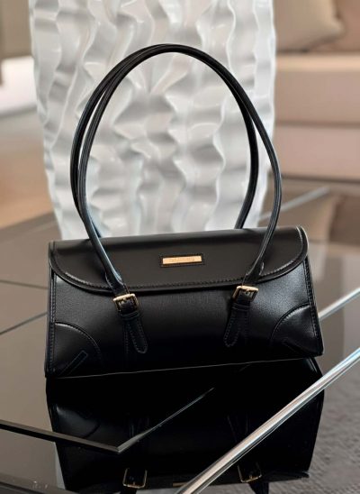 Bolso de mano tipo baguette